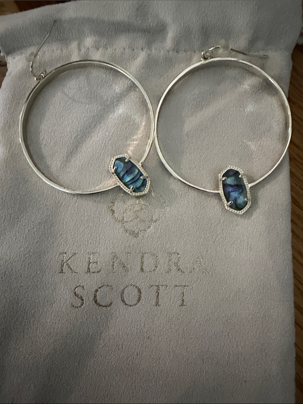Kendra Scott Silver Hoop Earrings with Iridescent Blue-Green Abalone